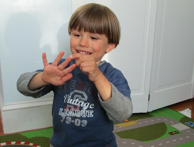 child counting fingers